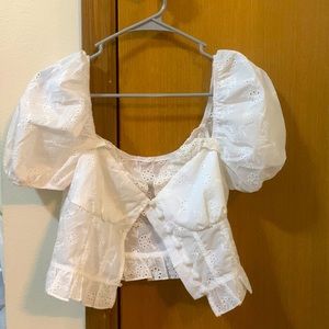 White cropped button blouse.